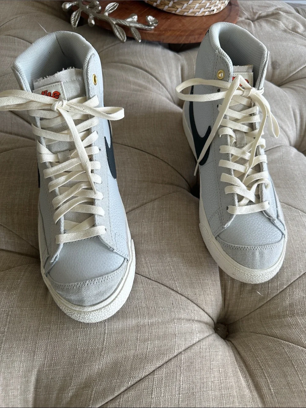 Nike High-Top Sneakers in White with Black Swoosh